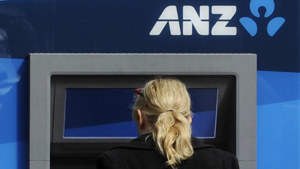 File photo of a customer using an ANZ ATM