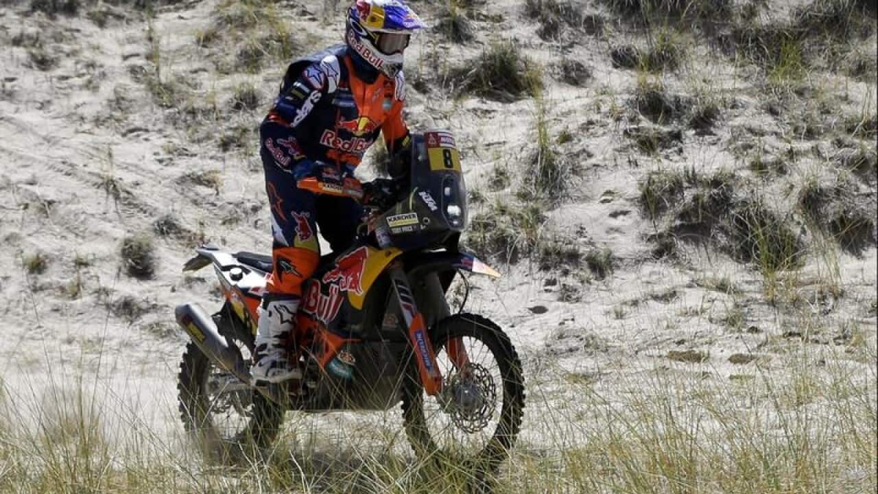 Toby Price, of Australia, rides his KTM motorbike