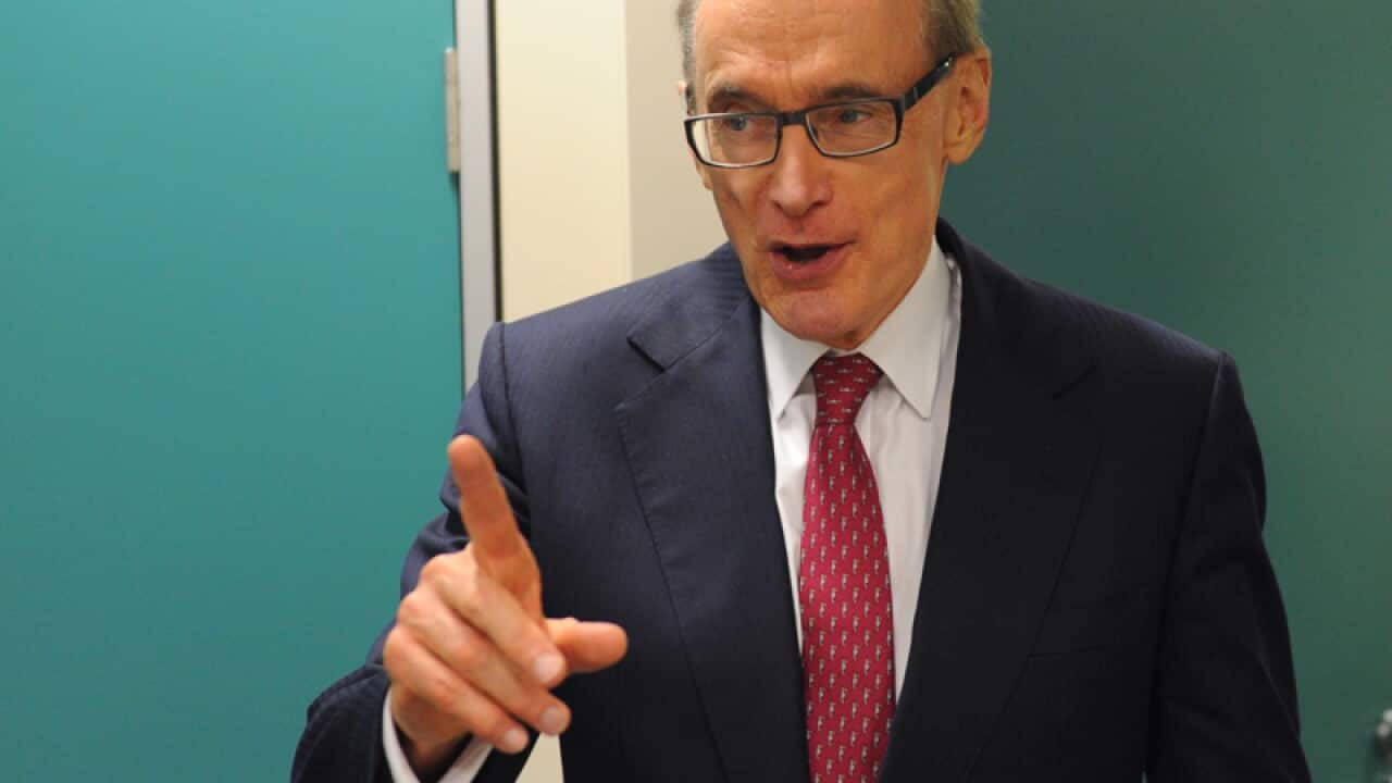 Former foreign minister Bob Carr speaks to the media