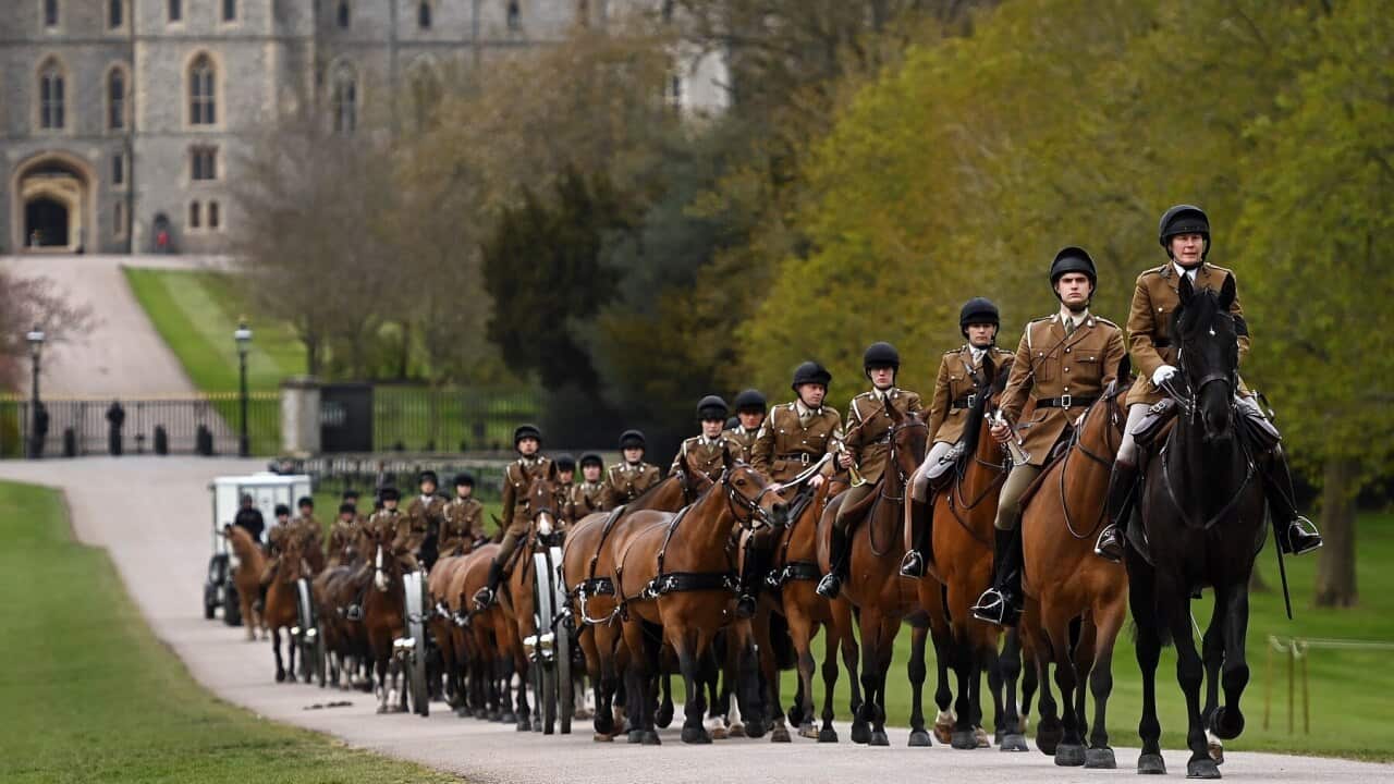 Members of the King's Troop Royal Horse Artillery prepare for Prince Philip's funeral