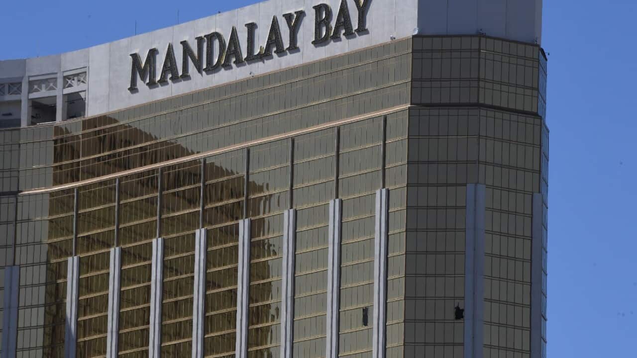 Broken windows are seen on the 32nd floor of the Mandalay Bay Resort and Casino after a lone gunman opened fired (Getty)