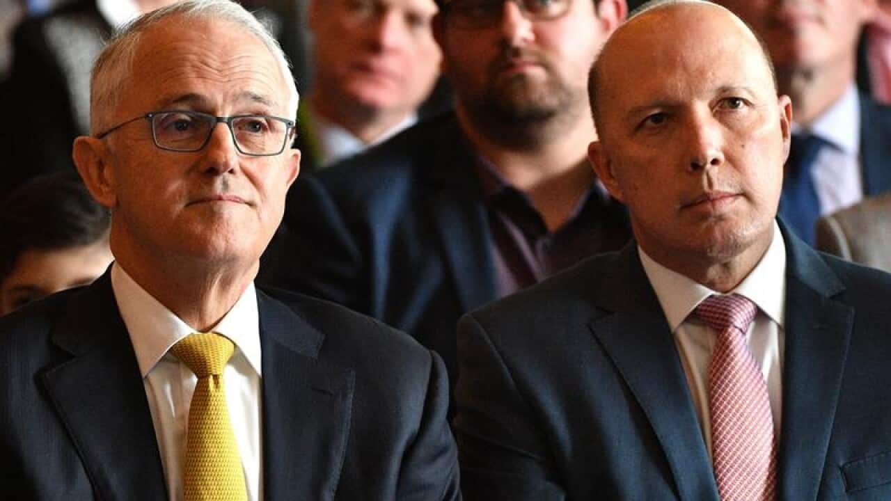 Malcolm Turnbull and Home Affairs Minister Peter Dutton at an event.