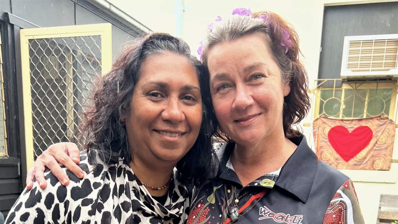 Michele Laurie (left) stands with Associate Professor Carlie Atkinson.