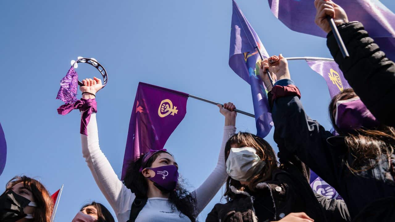 Women are seen protesting in Istanbul in March 2021 against a move to quit the European treaty on violence against women.