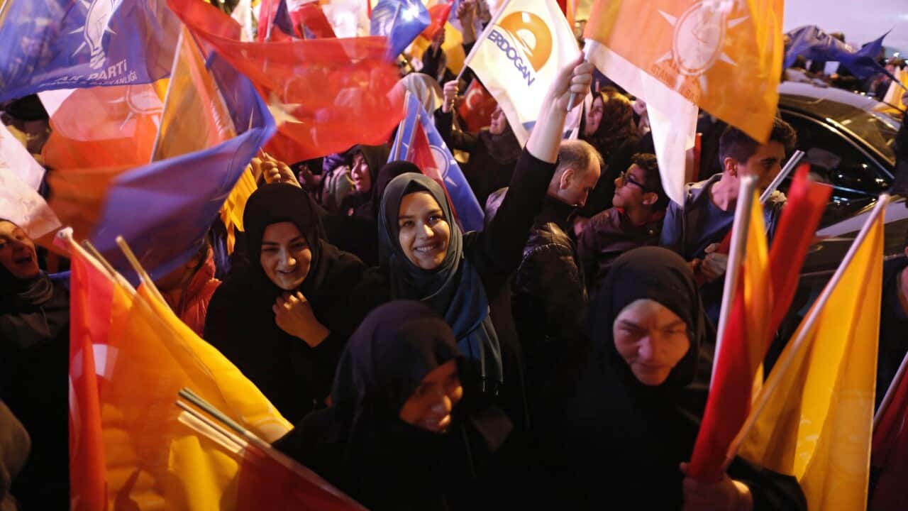 Supporters of Justice and Development Party (AKP) celebrate after hearing the early results of the general elections in Istanbul, Turkey, 01 November 2015. (EPA/CEM TURKEL)