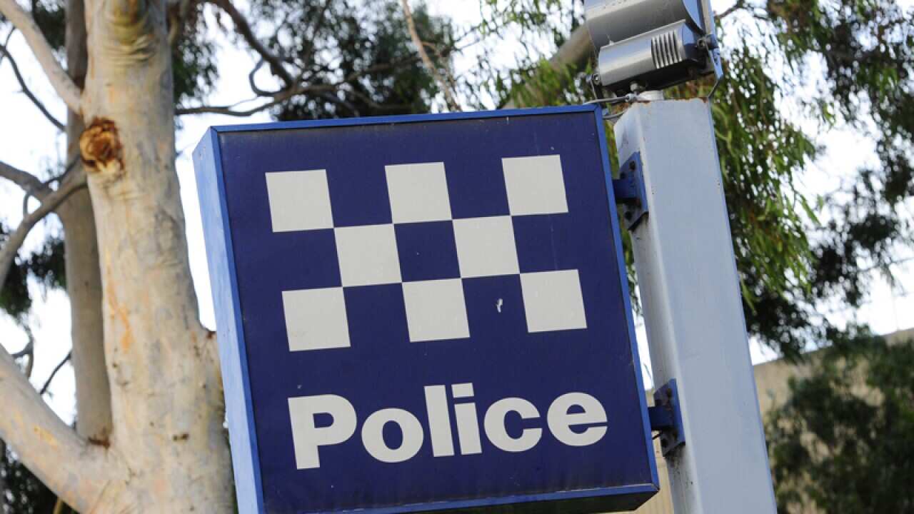 A police station sign