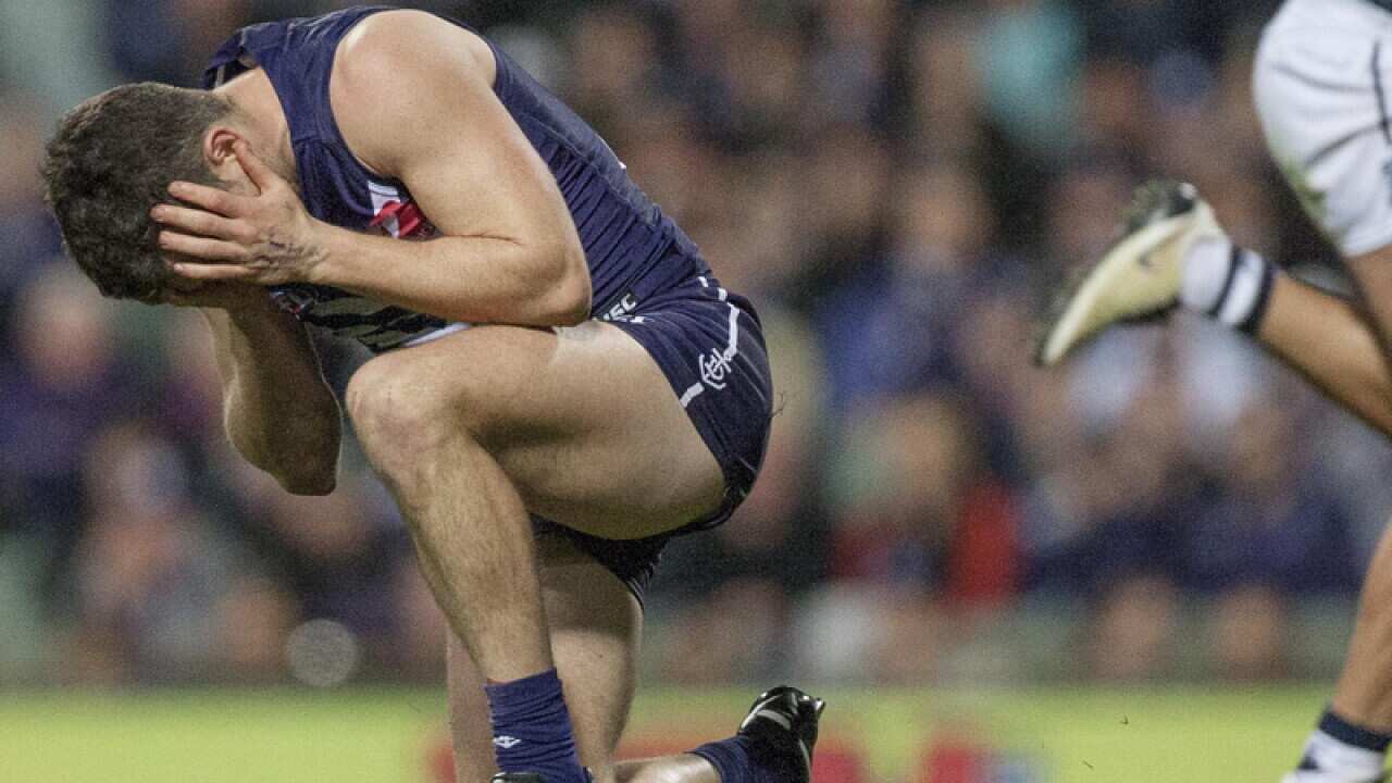 Hayden Ballantyne of the Dockers is injured