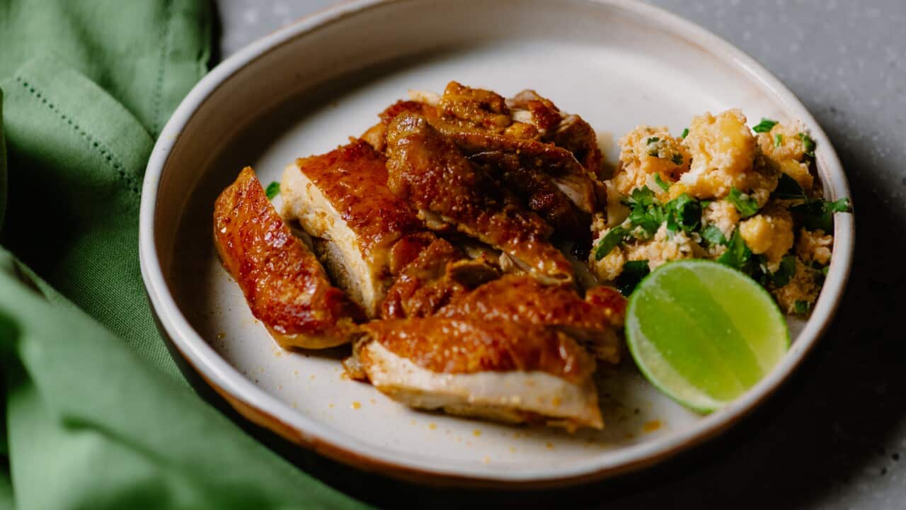 Crispy skin chicken with mango coconut salsa