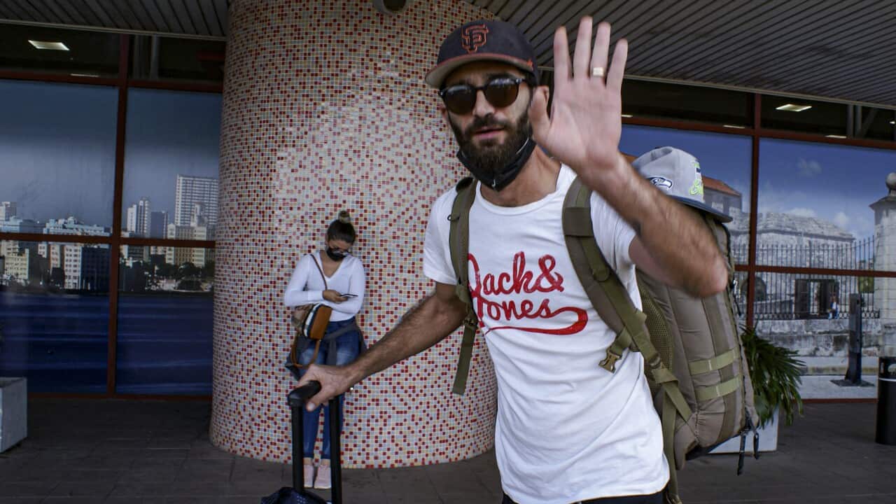 Cuban director of photography Raul Prado arrives at the airport in Havana to travel to the United States, on March 12, 2022.