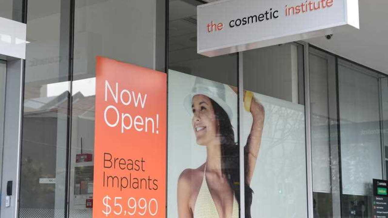An advertisement at the entrance to The Cosmetic Institute in Sydney.