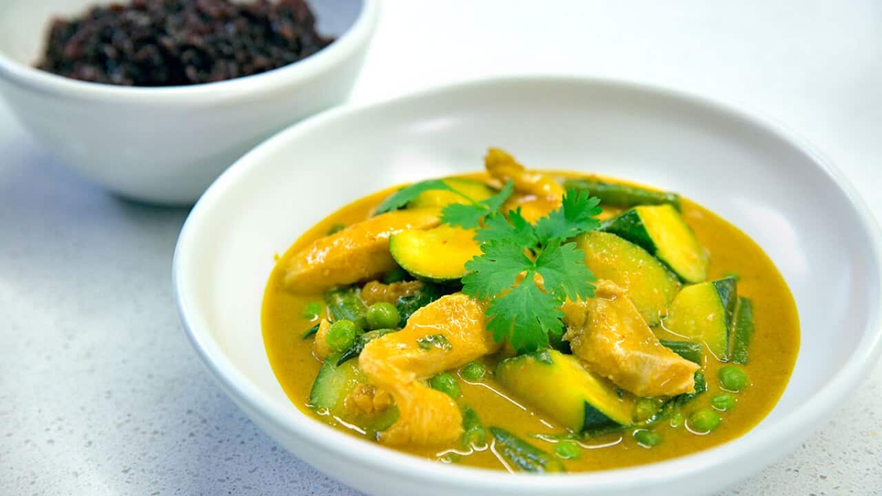 Coconut peanut chicken curry with black rice