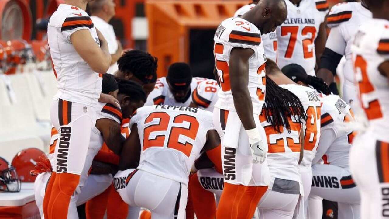 Cleveland Browns kneeling during the national anthem
