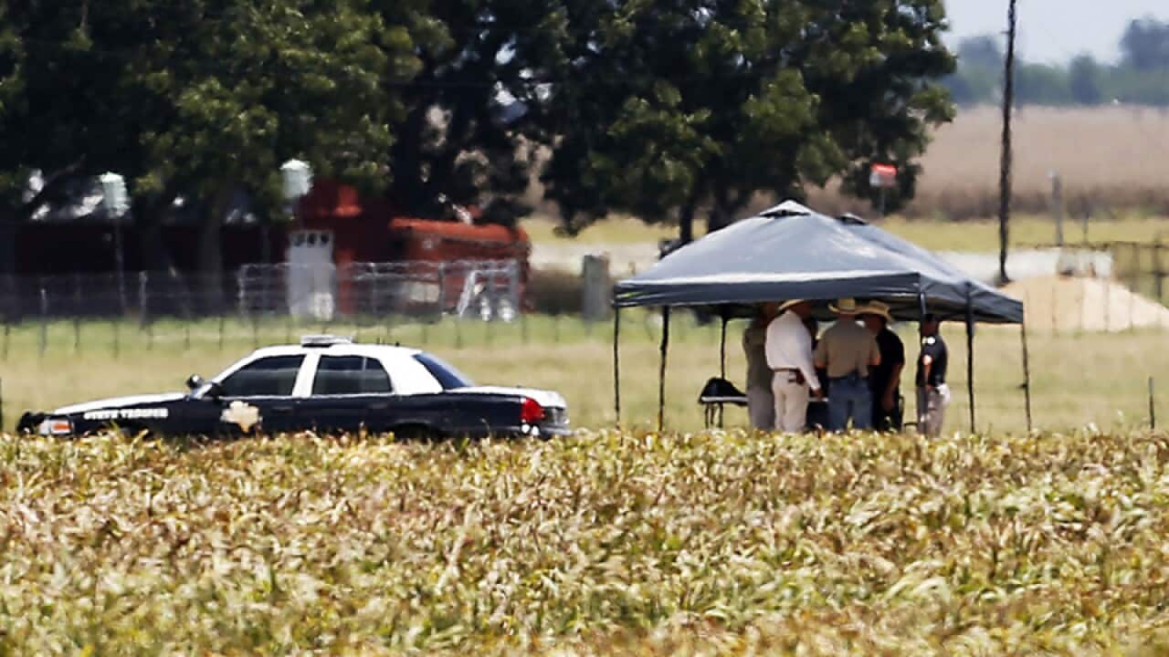 First responders and investigators at the scene of a balloon crash
