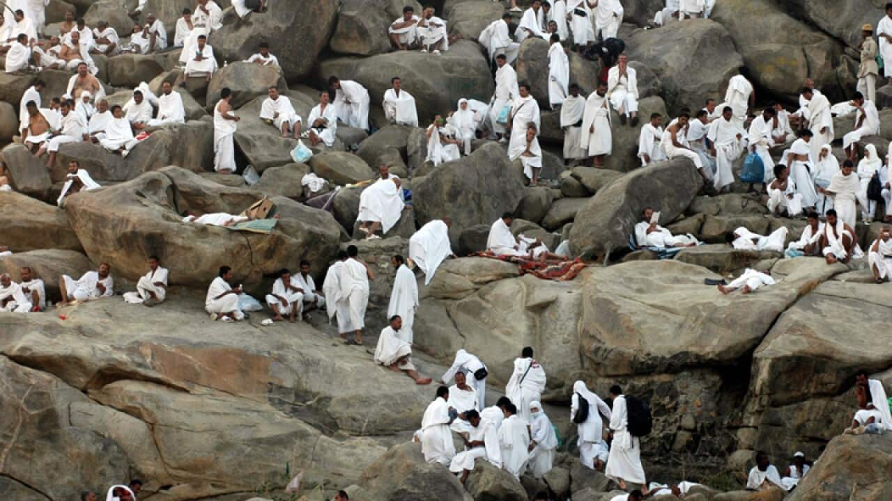 Muslim pilgrims congregate on Gebel Rahmah (Mount of Mercy) in Arafat