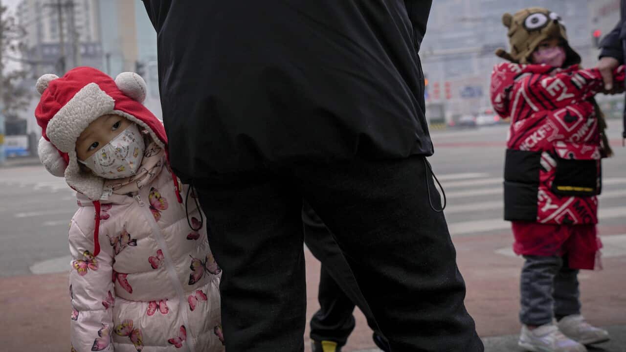 Children wearing face masks.