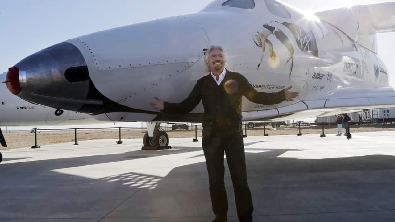 British entrepreneur Richard Branson poses with SpaceShipTwo