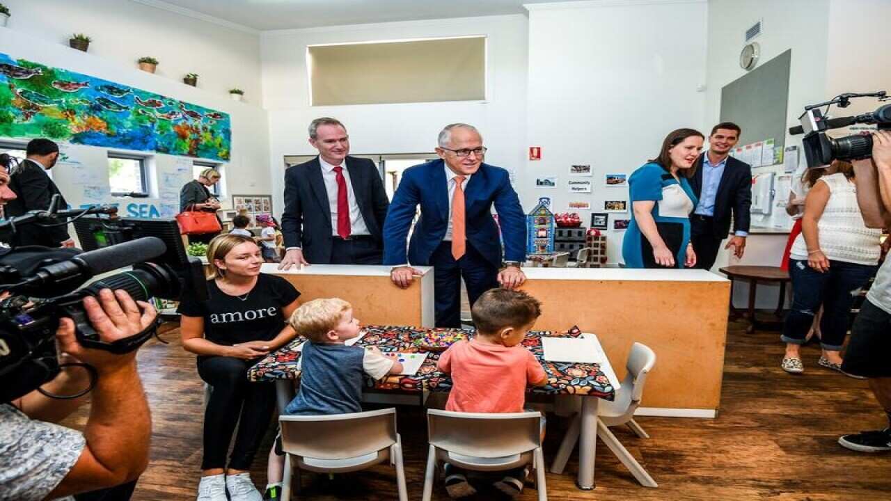 PM Malcolm Turnbull speaks with kids at a Sydney childcare centre.
