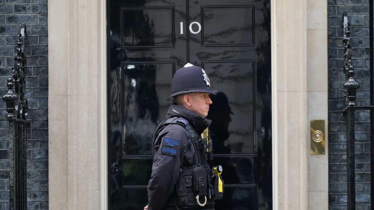 A police officer outside 10 Downing Street, in London.