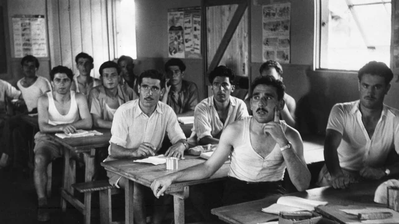 June 1954: Greek immigrants to Australia attend English language lessons at the Bonnegilla Reception Centre near Alderbury, Victoria.