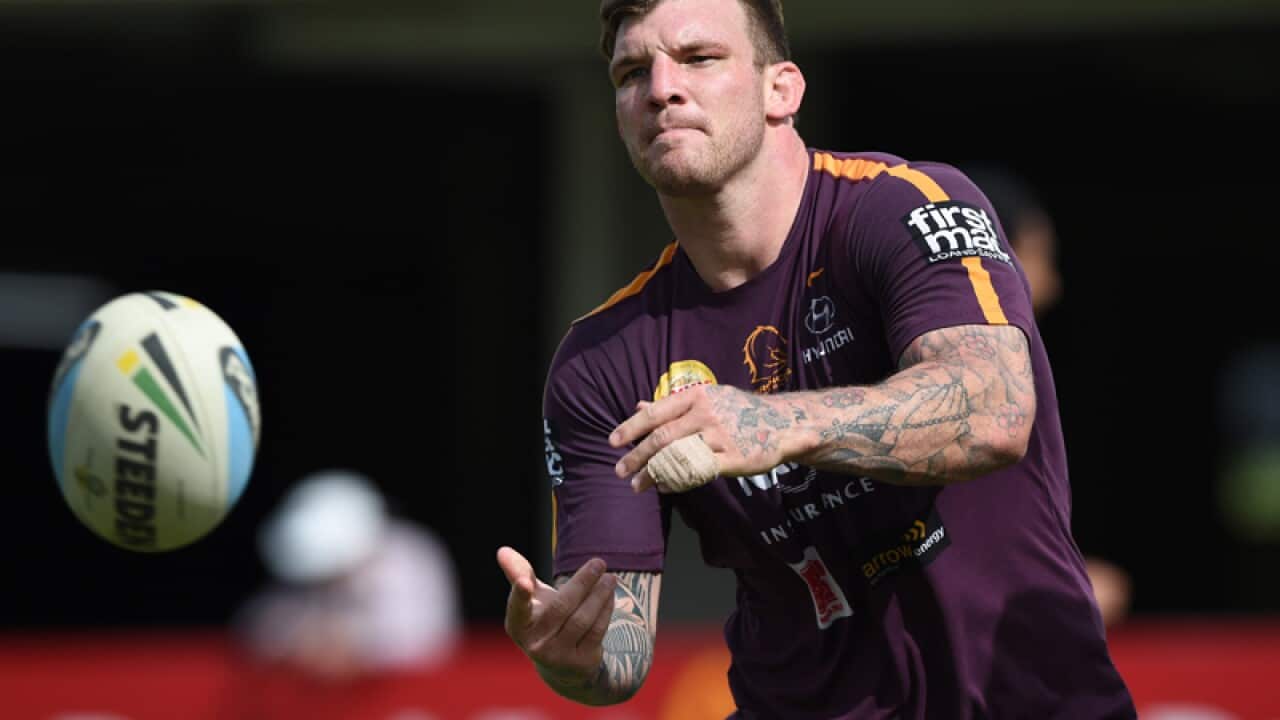 Josh McGuire passes the ball during Brisbane Broncos