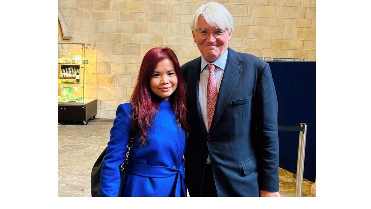 Burma Campaign UK, Campaign Manager Zoya Phan and UK Government Minister Andrew Mitchell at Burma debate in UK Parliament.jpg