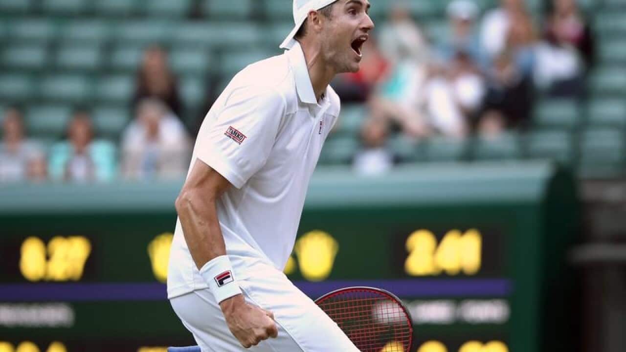 John Isner celebrates his win