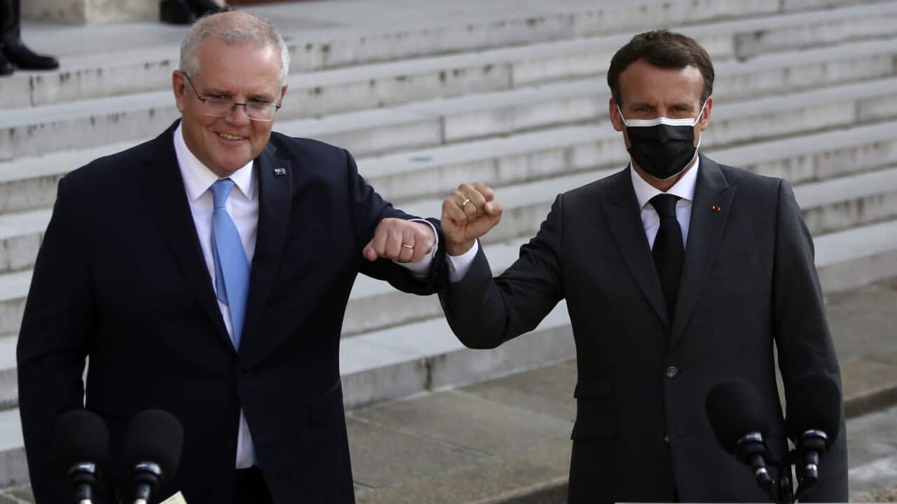 French President Emmanuel Macron, right, and Prime Minister Scott Morrison at a joint press conference before a working dinner in Paris, June 15, 2021.