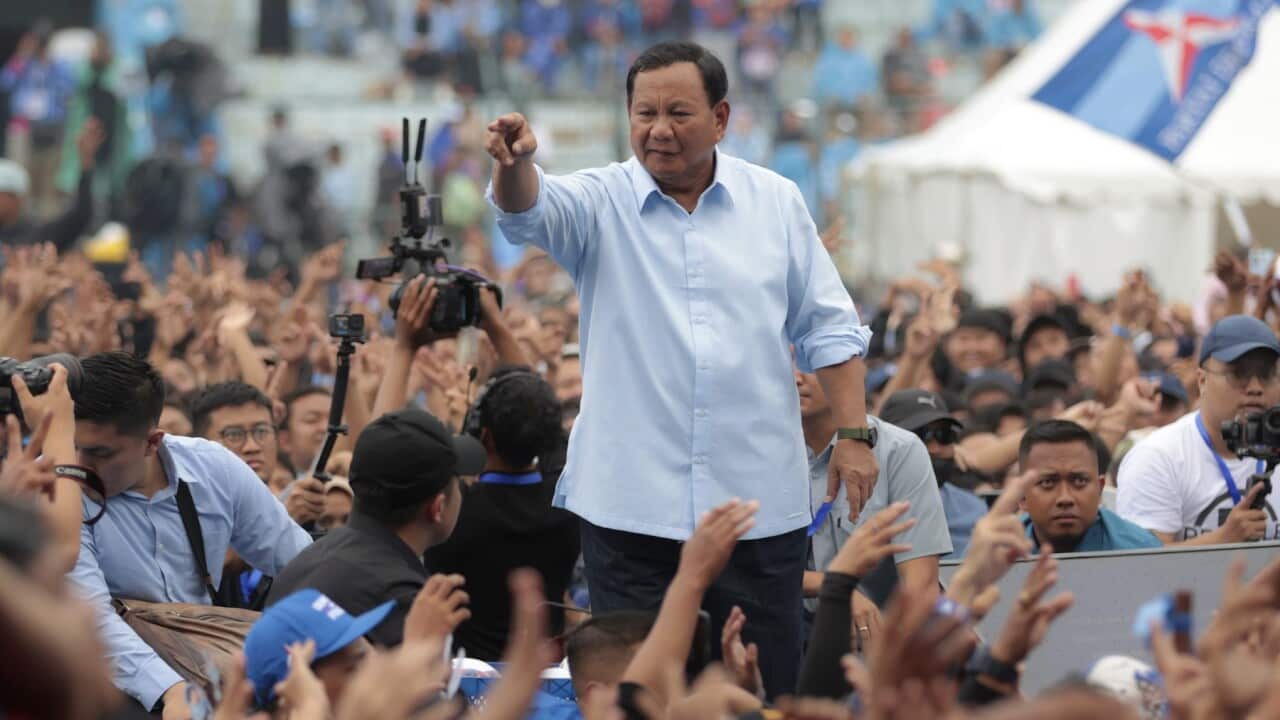Indonesian presidential candidate Prabowo Subianto greets supporters during his campaign rally in Malang, East Java, Indonesia.