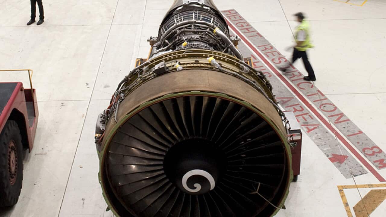File photo of maintenance being carried out on a Qantas jetliner