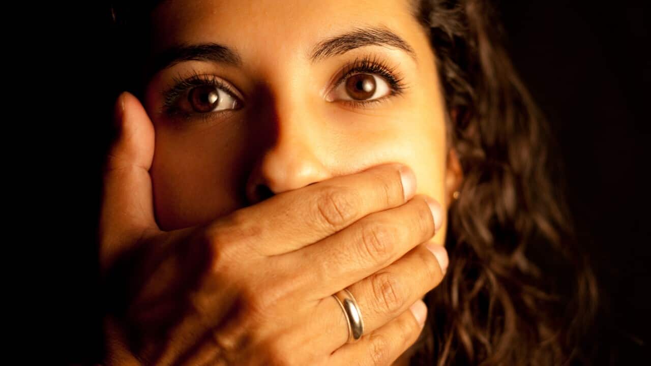 Abused Woman being silenced