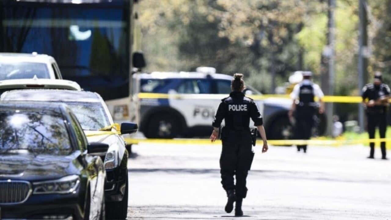 Canadian police officers near the scene of the incident.jpg