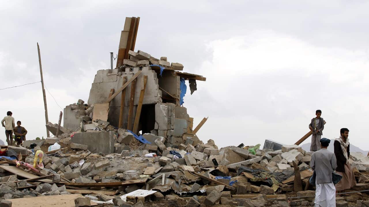 Yemenis inspect houses allegedly destroyed by an airstrike carried out by the Saudi-led coalition on the outskirts of Sanaa, Yemen, 26 August 2015.