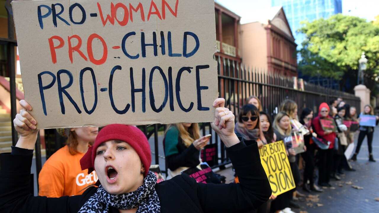 Protesters gather outside of the NSW State Parliament building urging MPs to support NSW bill to decriminalise abortion in Sydney on Thursday, May 11, 2017.