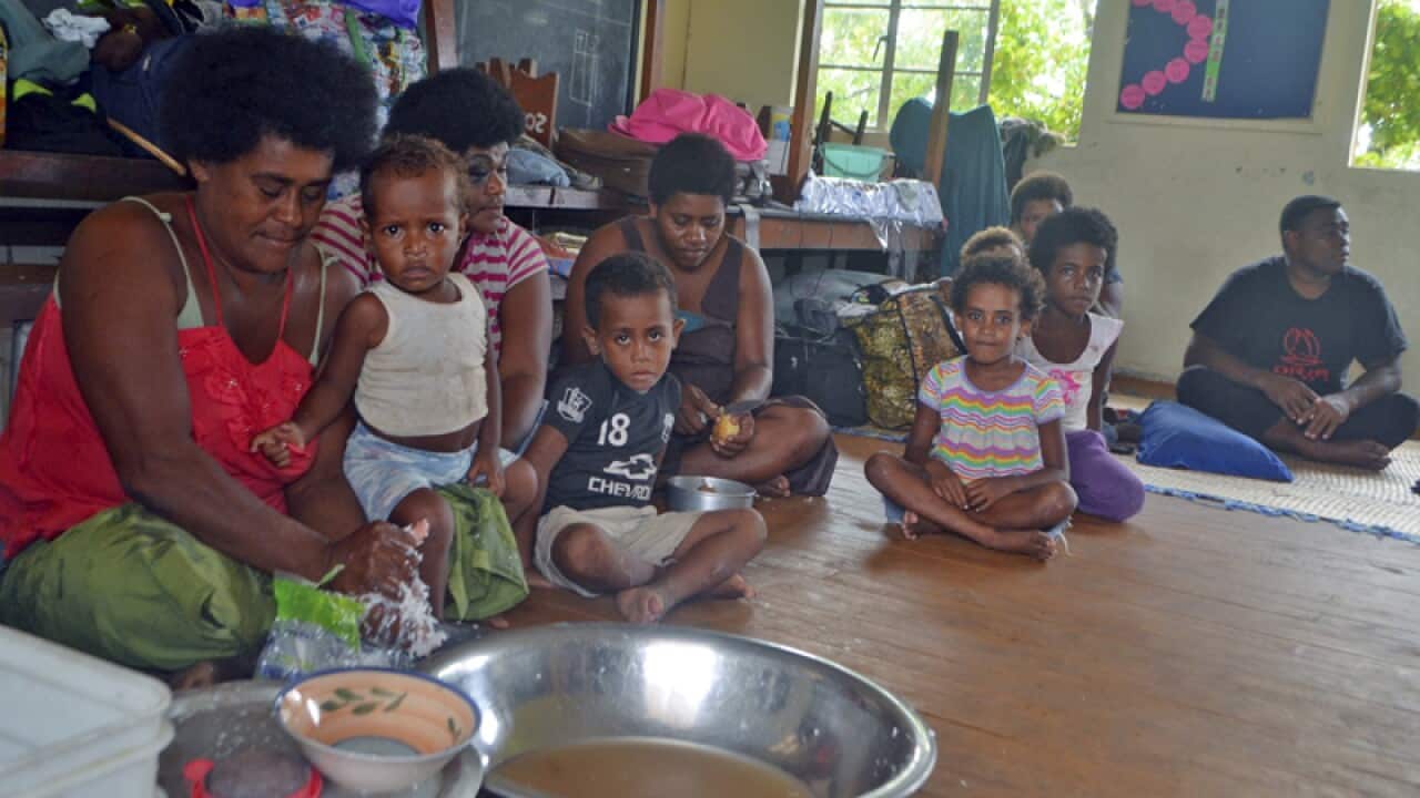 an evacuation center in Navua, Fiji.