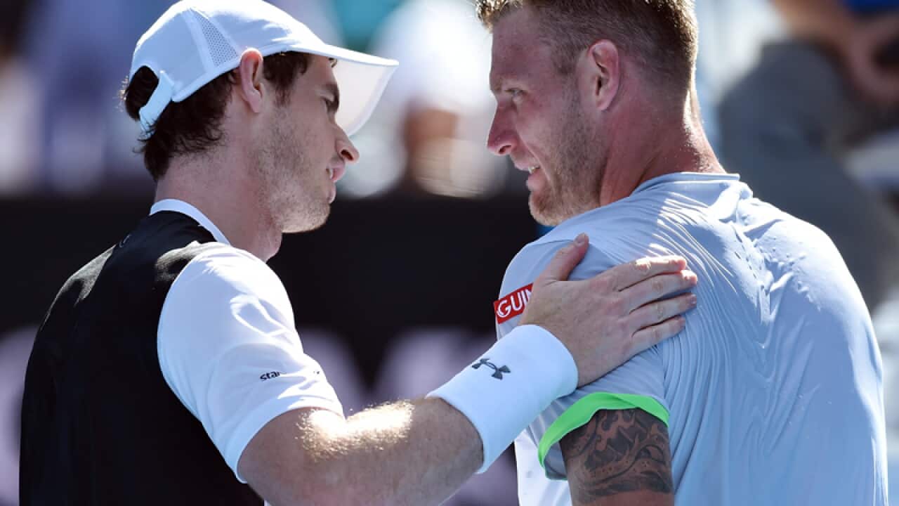 Andy Murray (L) and Sam Groth at the Australian Open