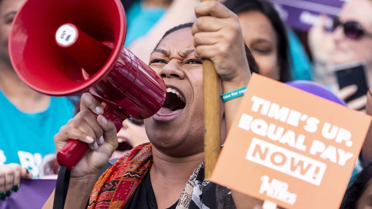 Early education workers rallying before the pandemic hit
