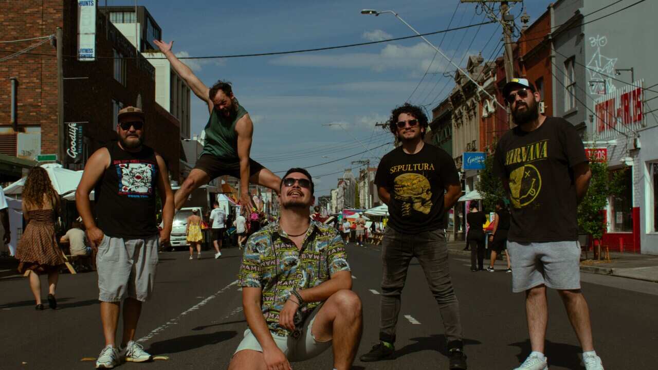 Members of the Melbourne-based rock band, Fire Roots.