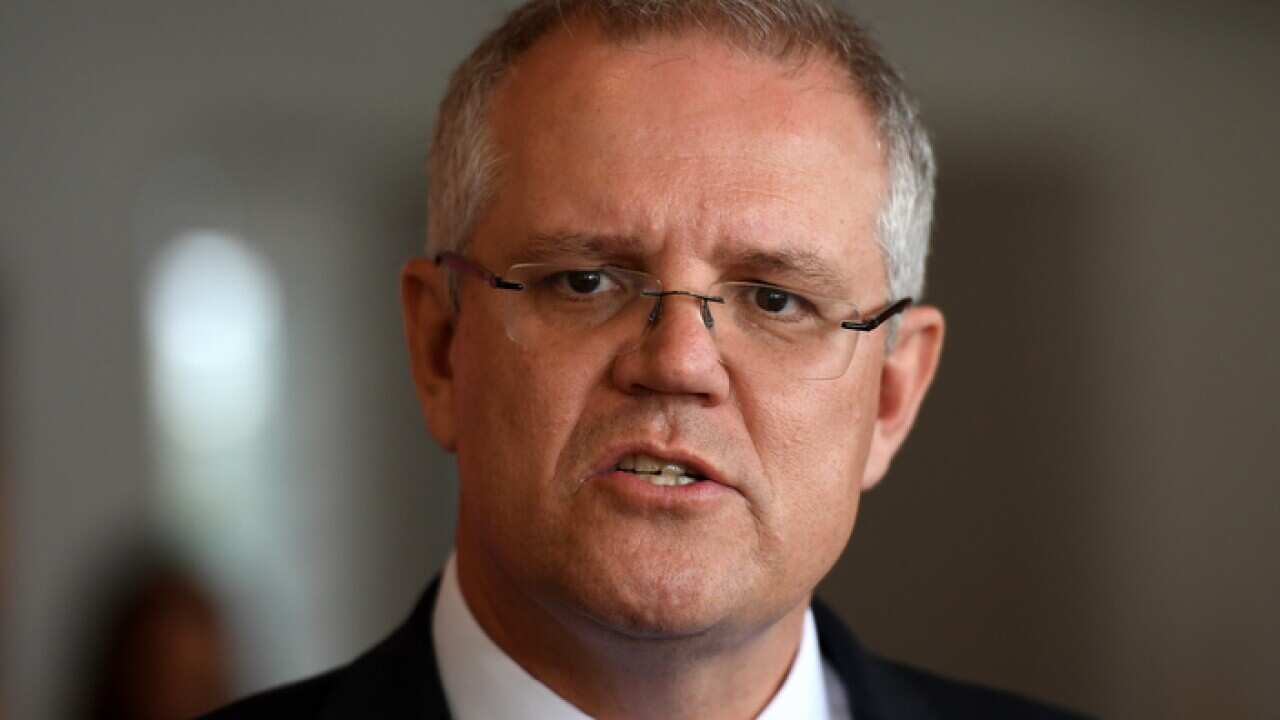 Australian Prime Minister Scott Morrison speaks during a visit to Youngcare House in Brisbane, Wednesday, September 5, 2018. (AAP Image/Dan Peled) NO ARCHIVING