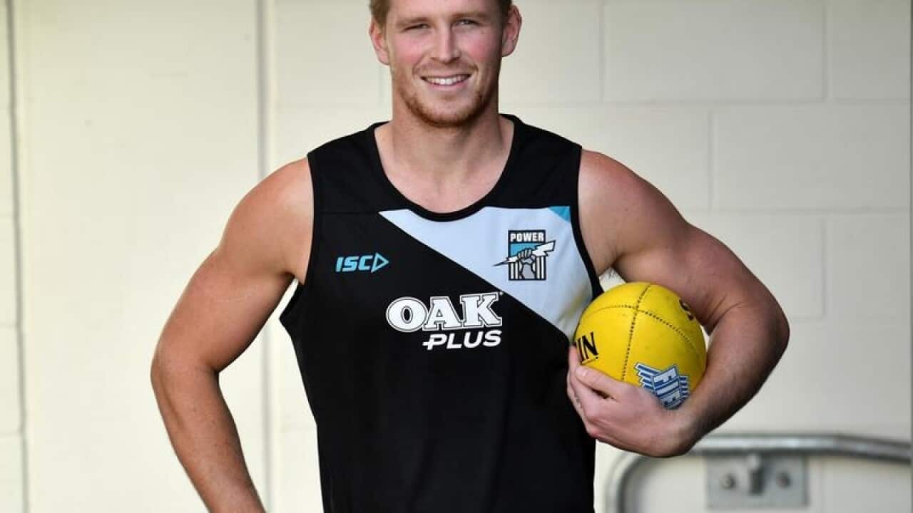 Tom Clurey of the Power poses for a photograph before training.