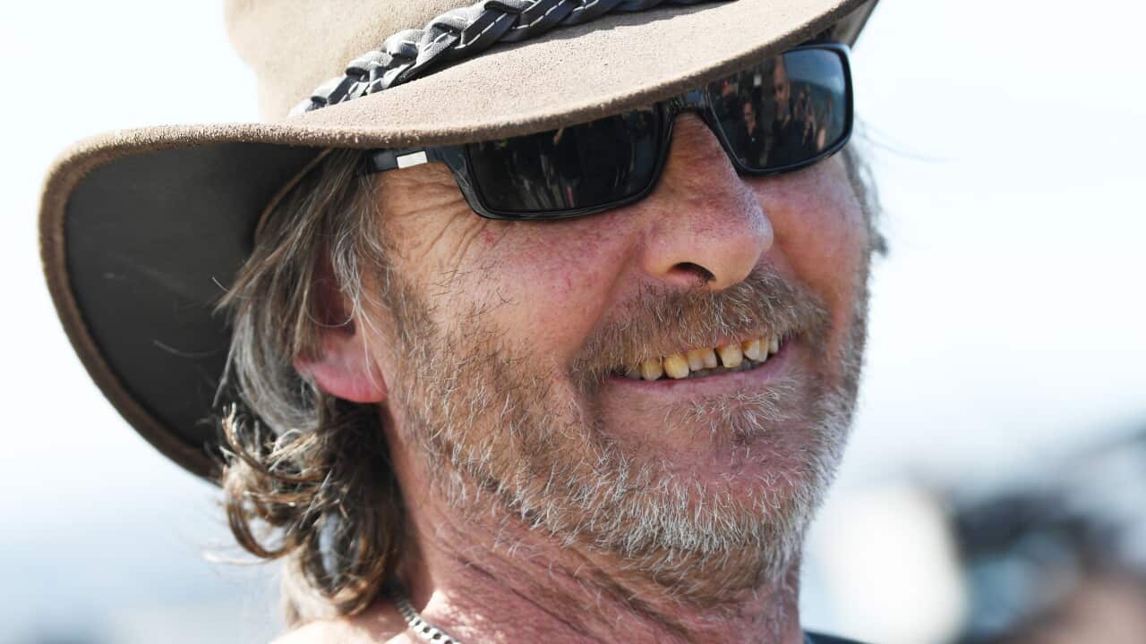 Fisherman Derek Robinson on his to return at Encounter Bay, South Australia.