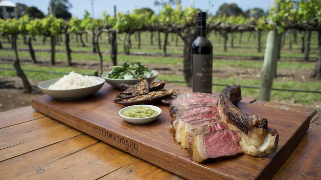 Seared wagyu tomahawk with soy sesame eggplant and chilli garlic paste