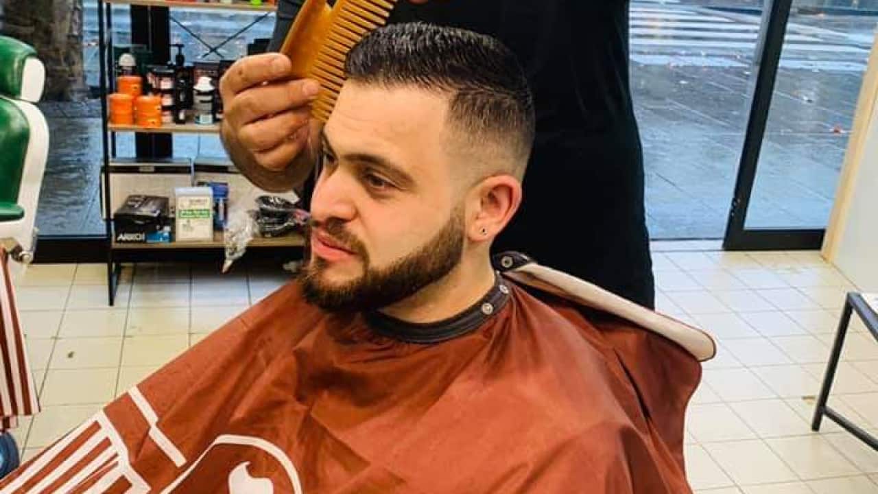 Mr. Mohamed Tallawi runs his small business