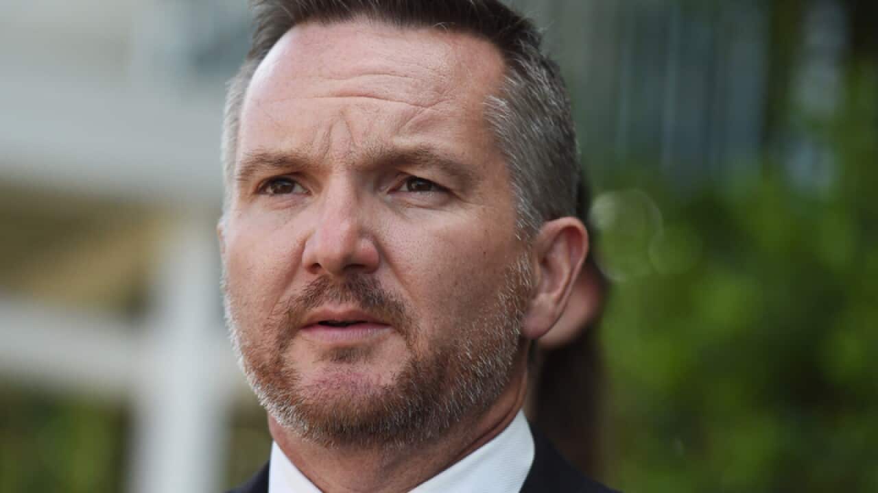 Chris Bowen at a presser.