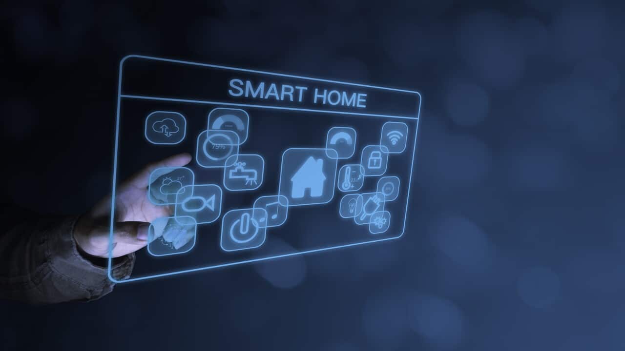 Businessman hand pointing at hologram on virtual screen, Smart home technology interface, new generation technology concept