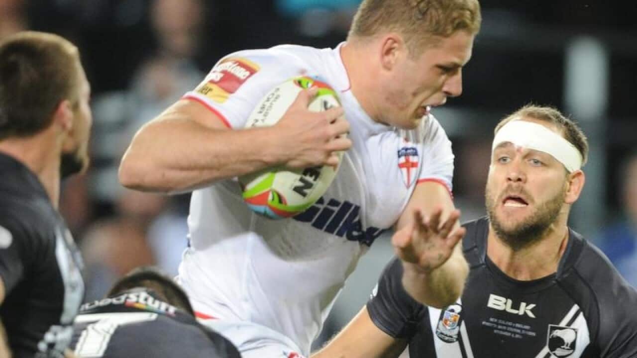 England's George Burgess breaks the New Zealand defence
