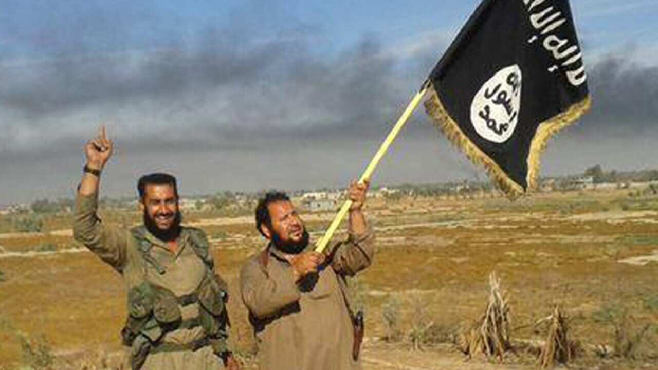 Islamic State militants outside of Fallujah, Iraq