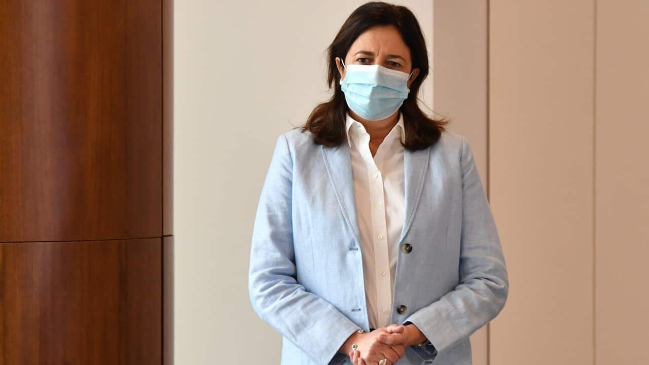Queensland Premier Annastacia Palaszczuk wears a mask