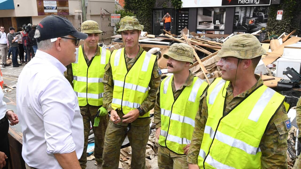 , Thursday, March 10, 2022. Prime Minister Morrison will make a formal request for a national emergency with the Queensland Premier after devastating floods ravaged southeastern parts of the state. (AAP Image/Darren England) NO ARCHIVING