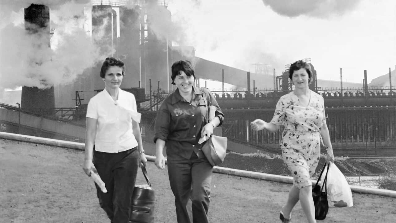 Slobodanka Joncevska (centre) leaves work at the Port Kembla steelworks with two female colleagues.