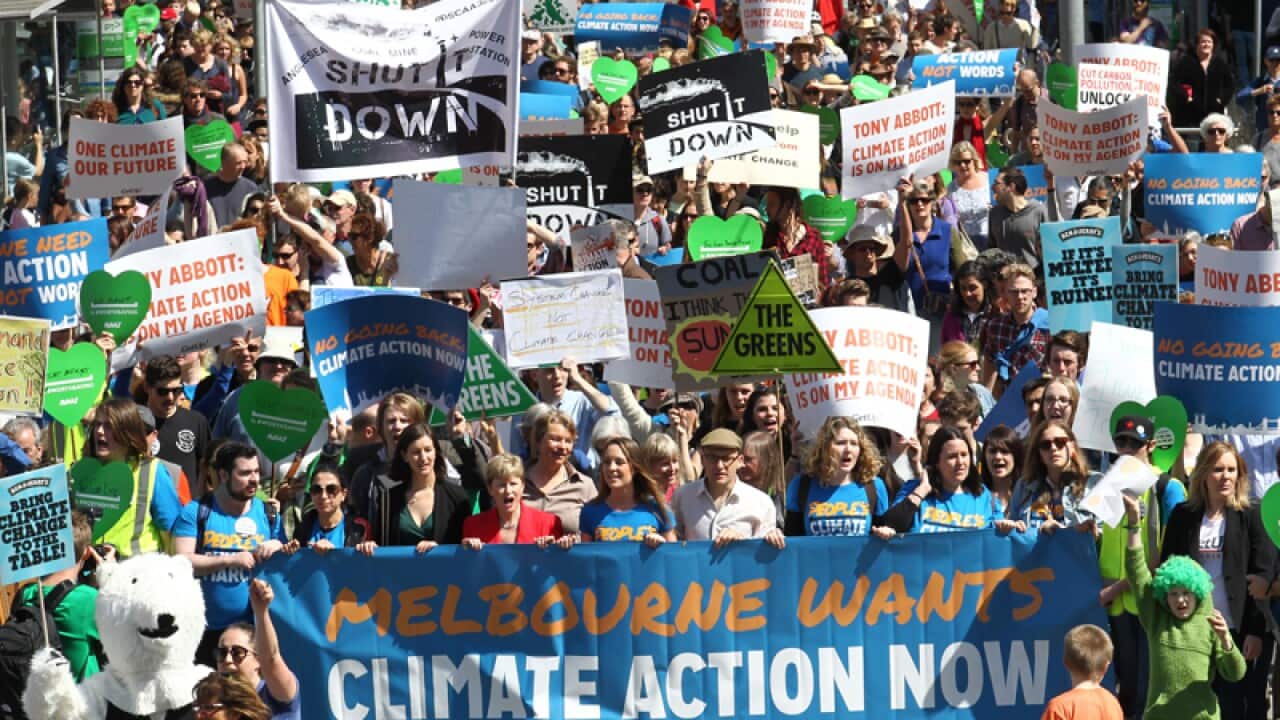Thousands march during a climate change rally in Melbourne